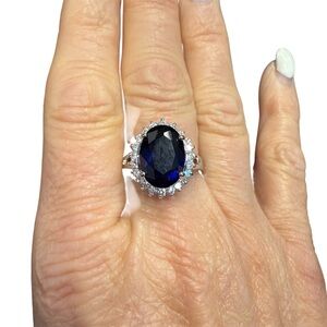 Avon Silvertone Ring Majestic Princess with Deep Blue Gemstone size 9 NIB